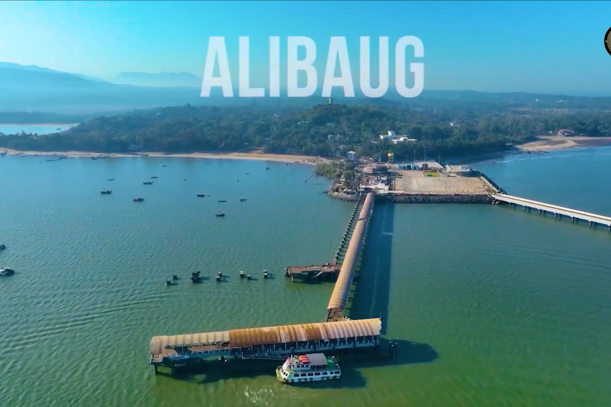 Prime 24-acre land in Alibaug for sale, featuring mountain views, ideal for agriculture, resort projects, and real estate investment.