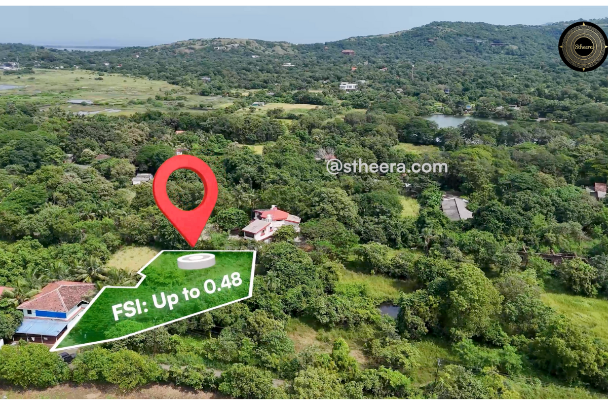 15.3 Guntha land with FSI up to 0.48 for sale in Dhokawde, Alibaug, surrounded by lush greenery and scenic views. Stheera Properties contact: stheera.com